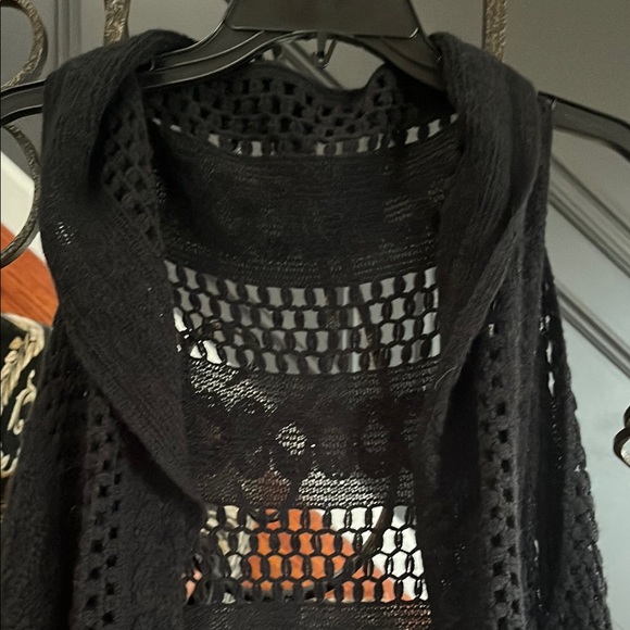 Black Fringe Shark Hem Open Front Knit Vest
Size M/L - Picture 7 of 13